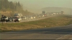 Convoy leads Canada fire evacuees through burning city to safety