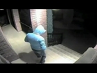 CCTV video released showing gunman firing into a house, narrowly missing man