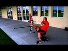 Armless Archer shooting cheez-its at 100 yards with his bow while using feet