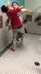 Hardcore head slam in bathroom fight.