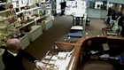 Jeweller swings baseball bat at armed robbers raiding his store - armed with an AXE