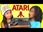 KIDS REACT TO ATARI 2600 VIDEO GAMES (E.T. and Asteroids)