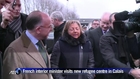French Interior Minister visits new refugee centre in Calais