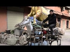 Check out this Chinese farmer riding his robot horse!