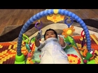 Baby plays on Fisher-Price Kick and Play Piano Gym
