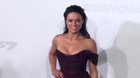Michelle Rodriguez deja su overol y se apropia del glamur en el lanzamiento de Furious 7